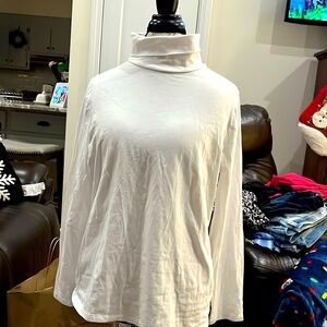Like new.  Barely worn turtleneck